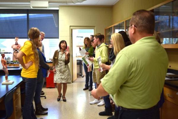 Faculty member giving a tour of a science lab